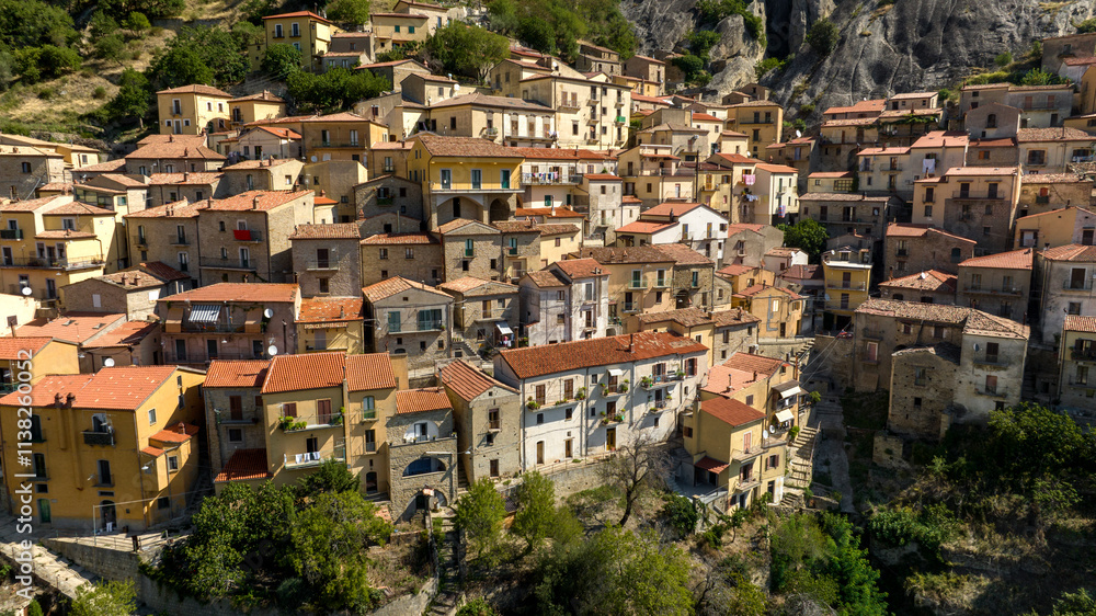 Aerial view of Castelmezzano, in the province of Potenza, Basilicata, Italy. It is a town built on a mountain in the Dolomiti Lucane park. Aerial view of Castelmezzano, in the province of Potenza, Basilicata, Italy. It is a town built on a mountain in the Dolomiti Lucane park.
