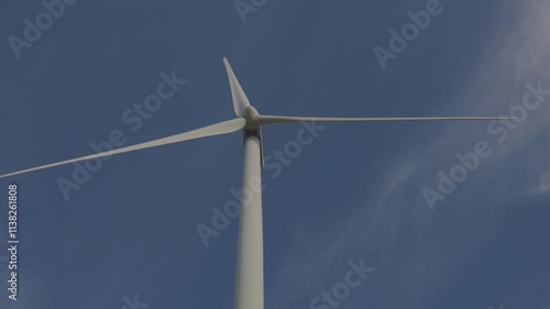 Wind Turbine Against a Cloudy Sky