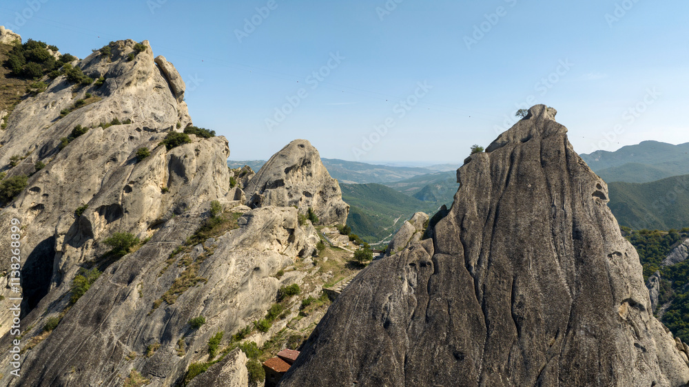Aerial view of a mountain peak in the Lucanian Dolomites near Castelmezzano, in the province of Potenza, Basilicata, Italy.