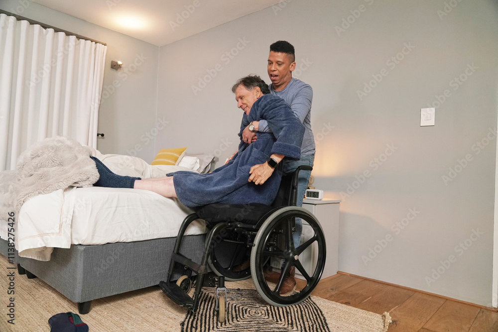 Man helping disabled friend getting out of bed Man helping disabled friend getting out of bed