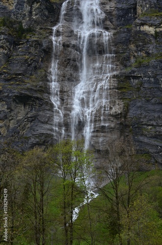 Picturesque view of beautiful mountain waterfall with moss outdoors