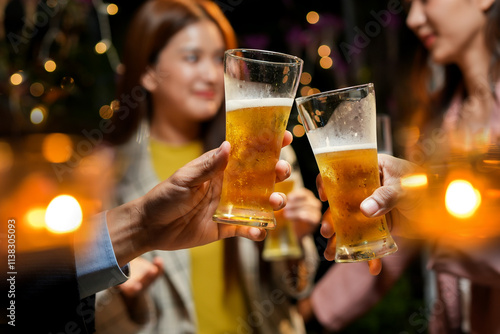 food and drink male friends are happy drinking beer and clinking glasses at a bar or pub.