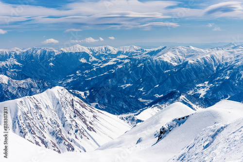 Landscape of snowy mountains, mountain range haze winter