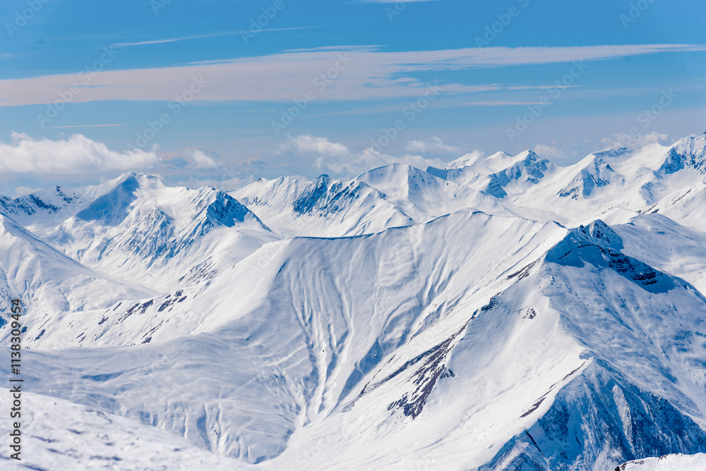 Landscape of snowy mountains, mountain range haze winter Landscape of snowy mountains, mountain range haze winter