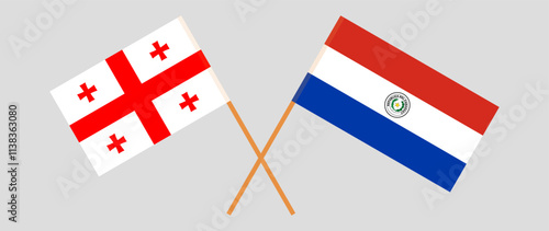 Crossed flags of Georgia and Republic of Paraguay. Official colors. Correct proportion. Vector illustration