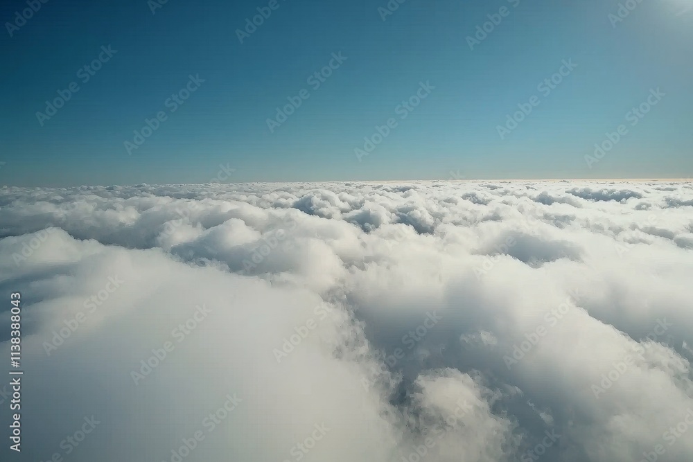 Naklejka premium A close-up view of white clouds against a blue sky, highlighting high cumulus clouds in azure skies, capturing a beautiful aerial cloudscape from above, featuring a sunny heaven landscape with a