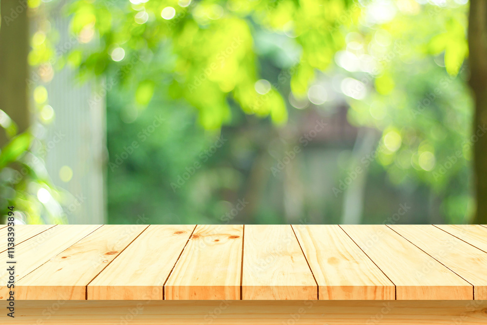 Φωτογραφία Wood floor with blurred trees of nature park background and summer season, produ