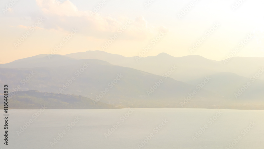 Soft mountain landscape with a tranquil lake view. Soft mountain landscape with a tranquil lake view.