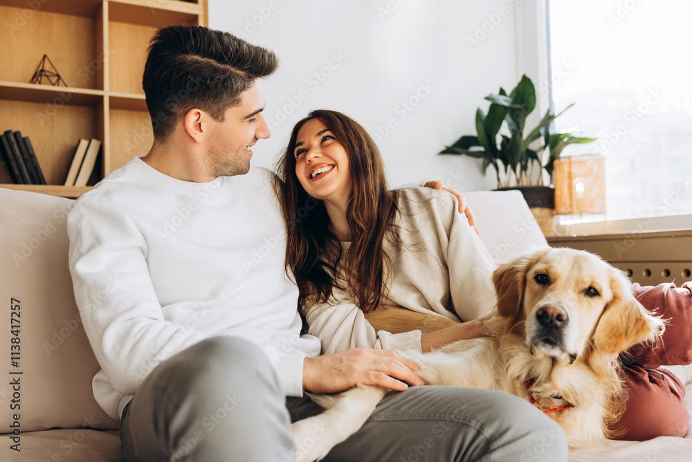 Happy couple relaxing on sofa with golden retriever, embracing love, laughter, and their furry friend Happy couple relaxing on sofa with golden retriever, embracing love, laughter, and their furry friend