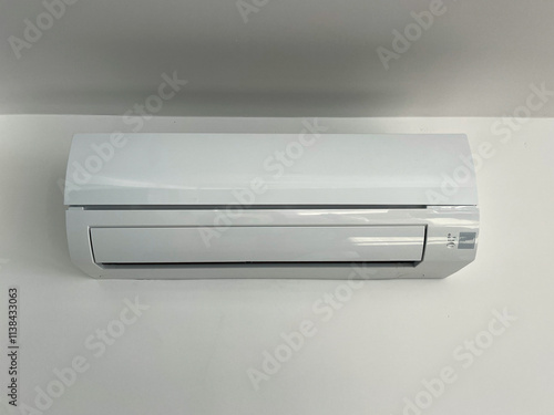 Closed White Wall-Mounted Air Conditioner Unit
