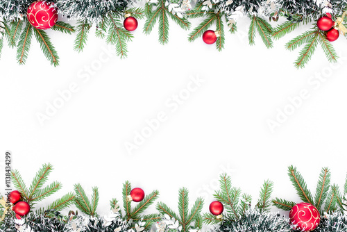 Christmas background with  Snowy pine branches and red ornaments