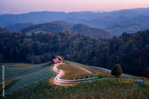 Amazing night landscape with the famous heart-shaped road, outlined by traffic lights, near Maribor and close to the Austrian border in Slovenia photo