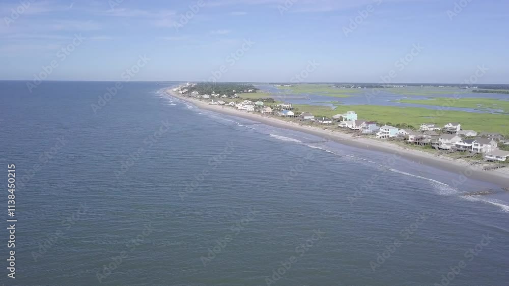 Aerial approaching shot to Folly Beach, South Carolina. Shot if coming in from the ocean. Aerial approaching shot to Folly Beach, South Carolina. Shot if coming in from the ocean.