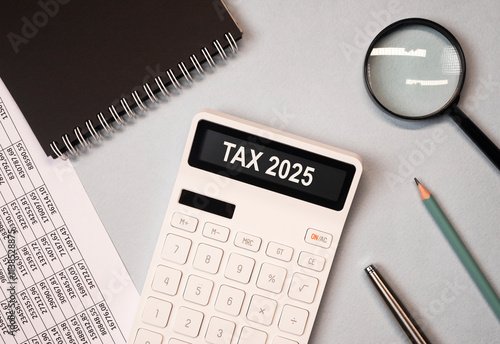 2025 year taxes calculation, taxation law, business economy concept. photo