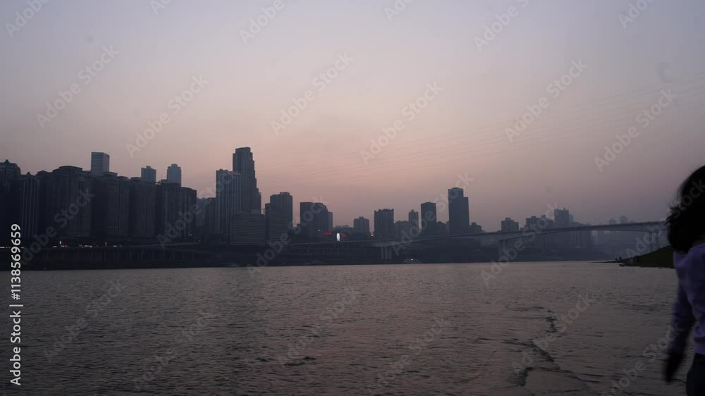 view of beautiful cityscape with downtown Chongqing and the Yangtze River, the financial and banking city in Chongqing China view of beautiful cityscape with downtown Chongqing and the Yangtze River, the financial and banking city in Chongqing China