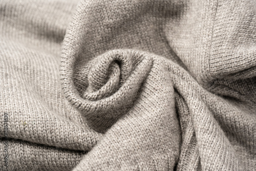 Grey wool sweater texture as a background. photo