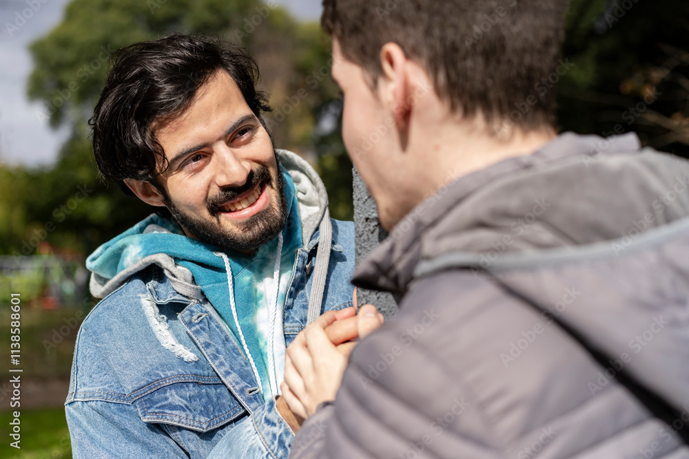 Fototapeta premium Two men looking into each other's eyes