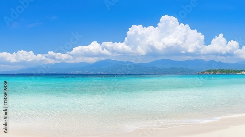 Serene Tropical Beach with Clear Water and Fluffy Clouds in Blue Sky