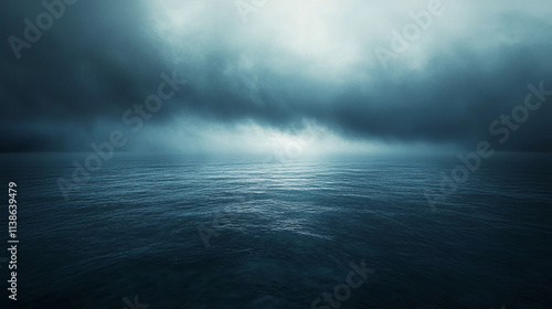 Cloudy sky with a large body of water. The water is calm and the sky is dark