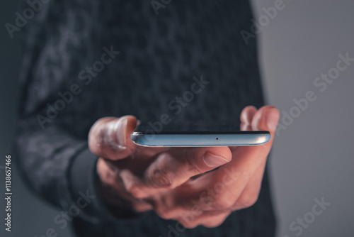 close up of a man using mobile phone,