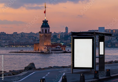 Obraz na płótnie Maiden's Tower in the background and bus stop advertising board in the at sunset, Istanbul, Turkey w salonie