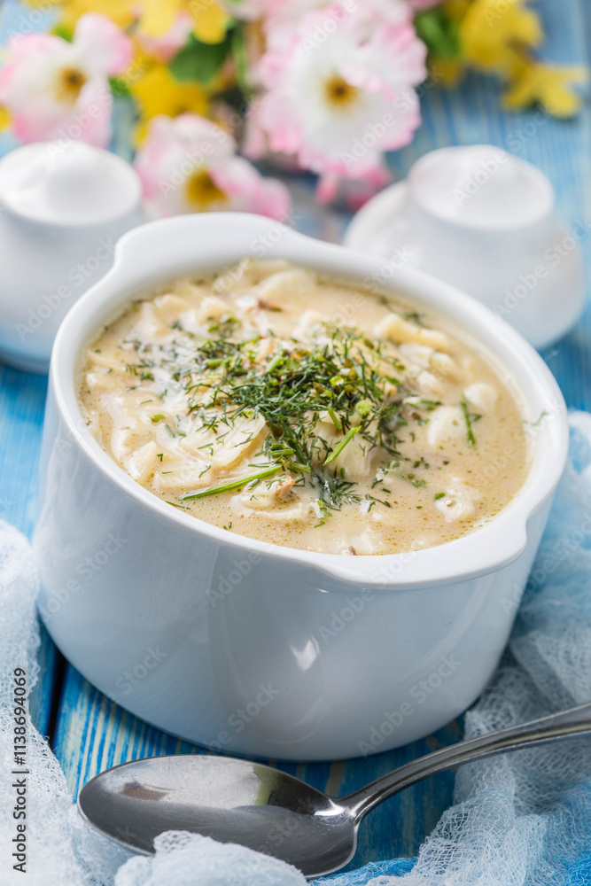 Tasty mushroom soup with noodles on a wooden table. Tasty mushroom soup with noodles on a wooden table.