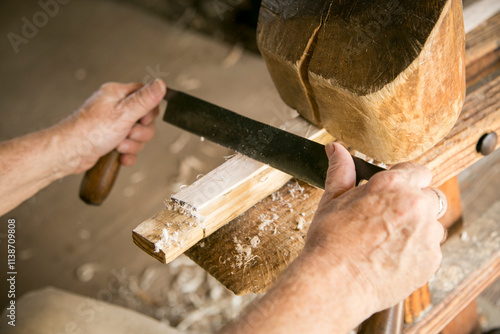 Mt. Pleasant, South Carolina. USA. Wood worker using period tools. photo