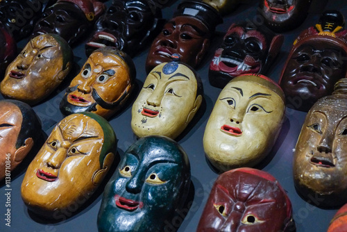 Lisbon, Portugal, Europe Display of Asian masks. photo