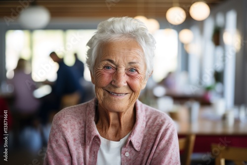 Portrait of a smiling American senior woman in front of nursing home