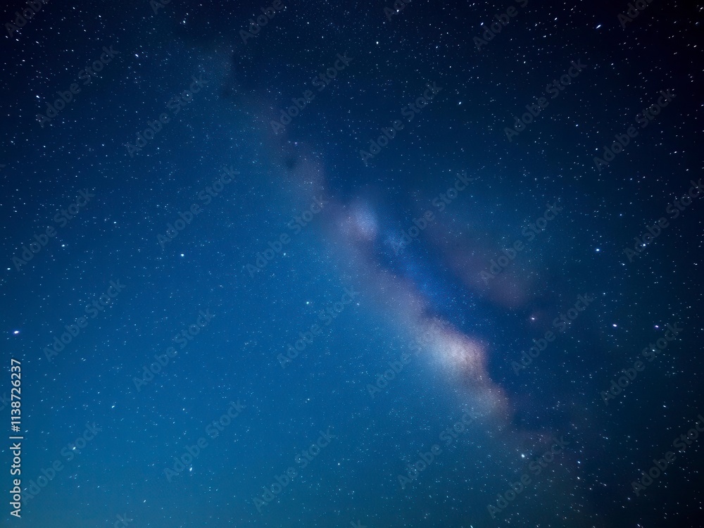 A mesmerizing view of a starry night sky filled with twinkling stars and galaxies, milky way, nature, nighttime A mesmerizing view of a starry night sky filled with twinkling stars and galaxies, milky way, nature, nighttime