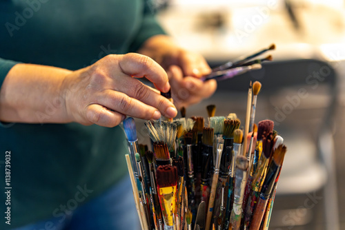 hands of artist with brushes