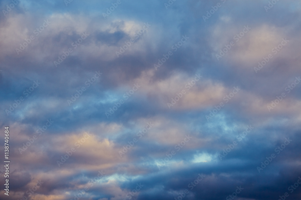 Winter morning: sunbeams light up gray clouds in the cold sky. Winter morning: sunbeams light up gray clouds in the cold sky.