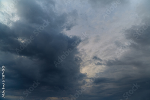 Gray clouds with faint light breaking through, a winter overcast day.