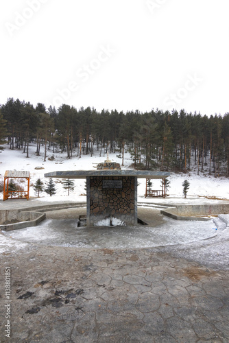 Historical fountain in the snow on a winter day