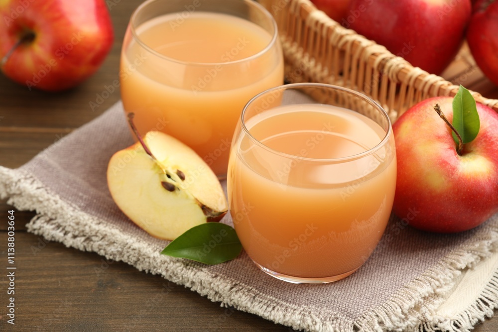 Tasty apple juice and fresh fruits on wooden table, closeup Tasty apple juice and fresh fruits on wooden table, closeup