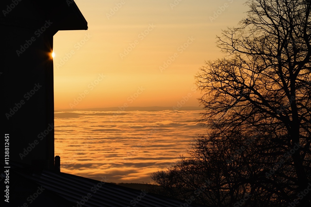 View of Hana covered in fog from Hostyn. Sunset. Czech Republic.