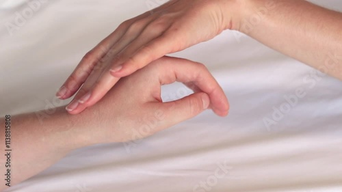 Wallpaper Mural Same-sex relationships, lesbians. Same-sex marriage and love concept. Happy lesbian couple. Two female hands touching each other against white sheets. Two female hands in bed close-up. LGBTQ Torontodigital.ca