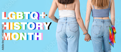 Young lesbian couple holdin...