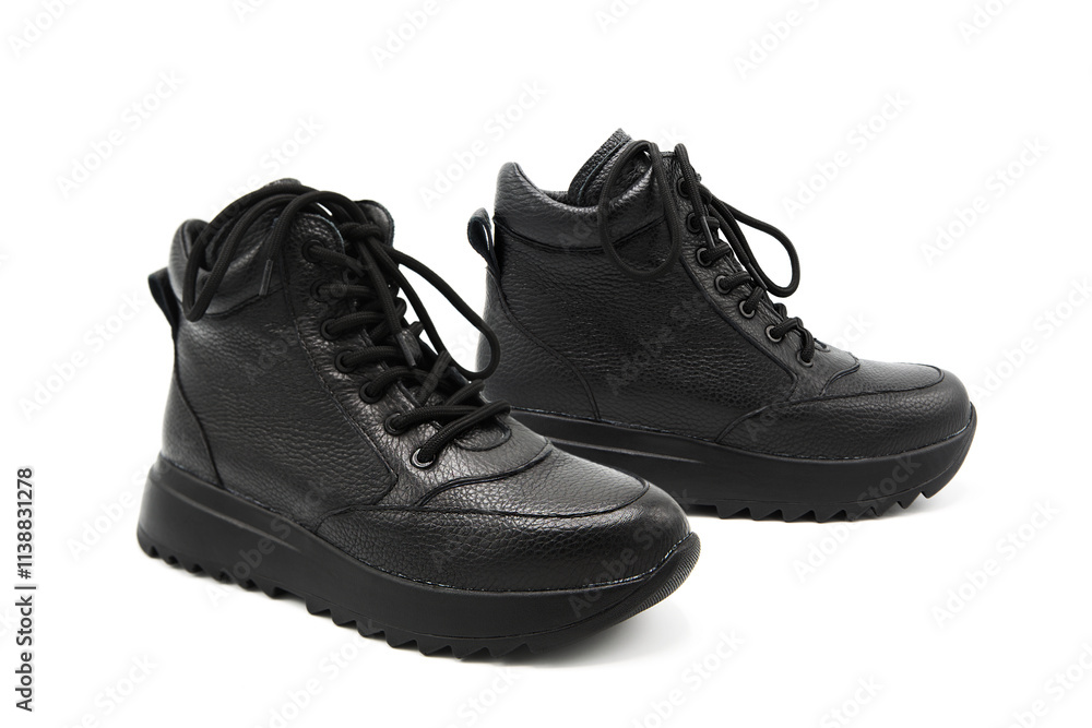 Fashionable leather lace-up sneakers isolated on white background. View from all sides. Fashionable leather lace-up sneakers isolated on white background. View from all sides.