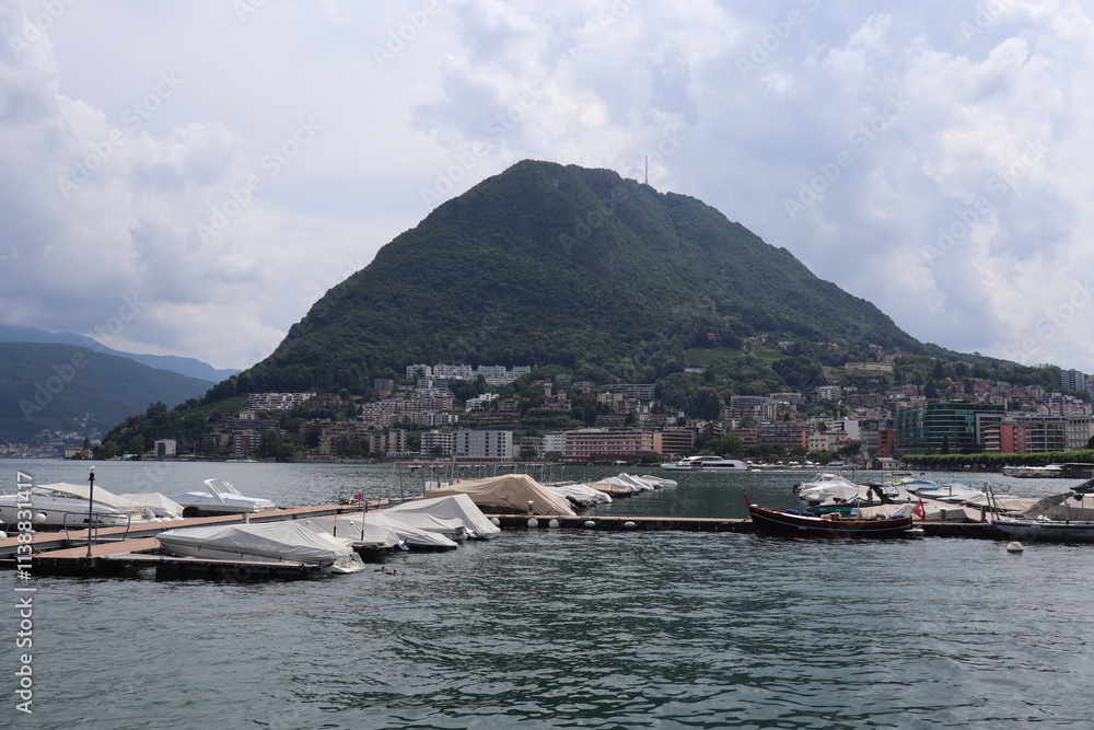 Landscape of lake Lugano on a cloudy summer day. Landscape of lake Lugano on a cloudy summer day.