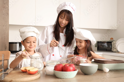 Female Asian chef with her ...