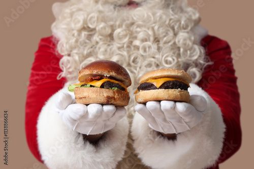 Santa Claus with tasty burg...