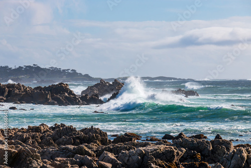 Obraz na płótnie Scenic view rocky Pacific Ocean coast along 17-Mile-Drive looking south, Del Monte Forest, California, USA against blue sky with clouds w salonie