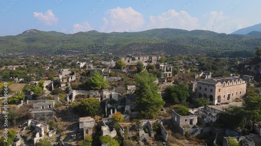 Aerial: deserted city with abandoned buildings and a mountain in the background. Aerial: deserted city with abandoned buildings and a mountain in the background.