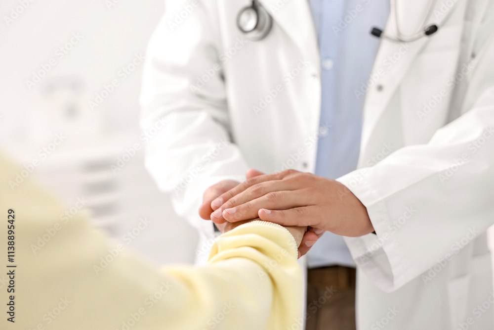 Healthcare worker supporting patient in hospital, closeup Healthcare worker supporting patient in hospital, closeup
