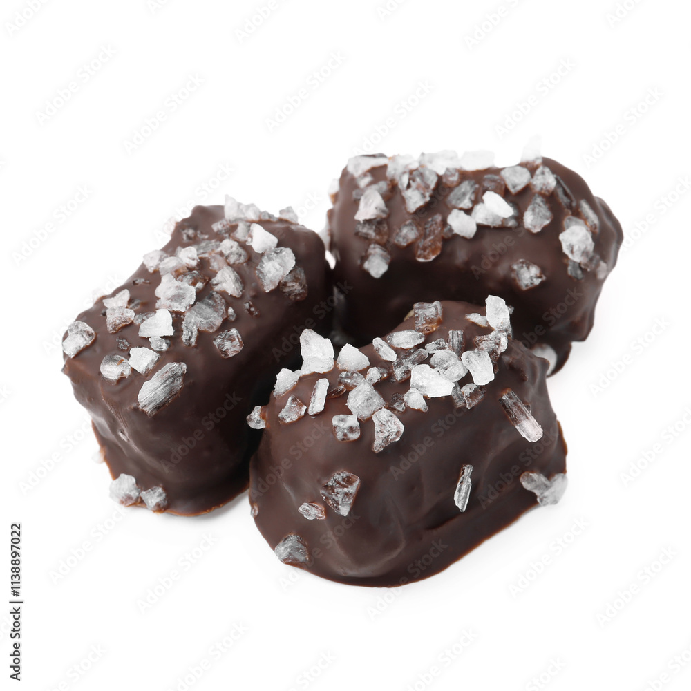 Tasty chocolate candies with salt isolated on white Tasty chocolate candies with salt isolated on white