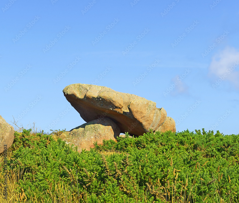 Atlantic ocean coast in Brittany near Ploumanach, France. The Pink Granite Coast, so-called because of the colour of its rocks, is one of the most beautiful stretches of Brittany coastline.