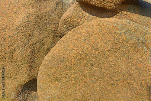 Atlantic ocean coast in Brittany near Ploumanach, France. The Pink Granite Coast, so-called because of the colour of its rocks, is one of the most beautiful stretches of Brittany coastline.