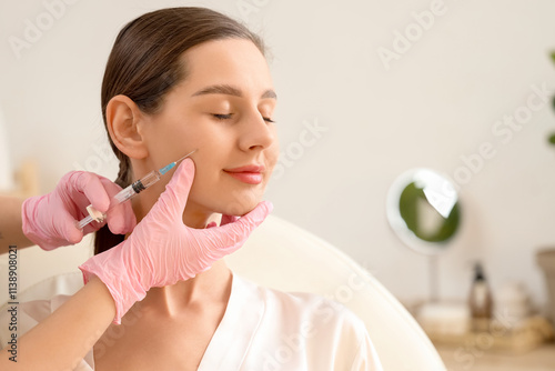 Young girl receiving filler...