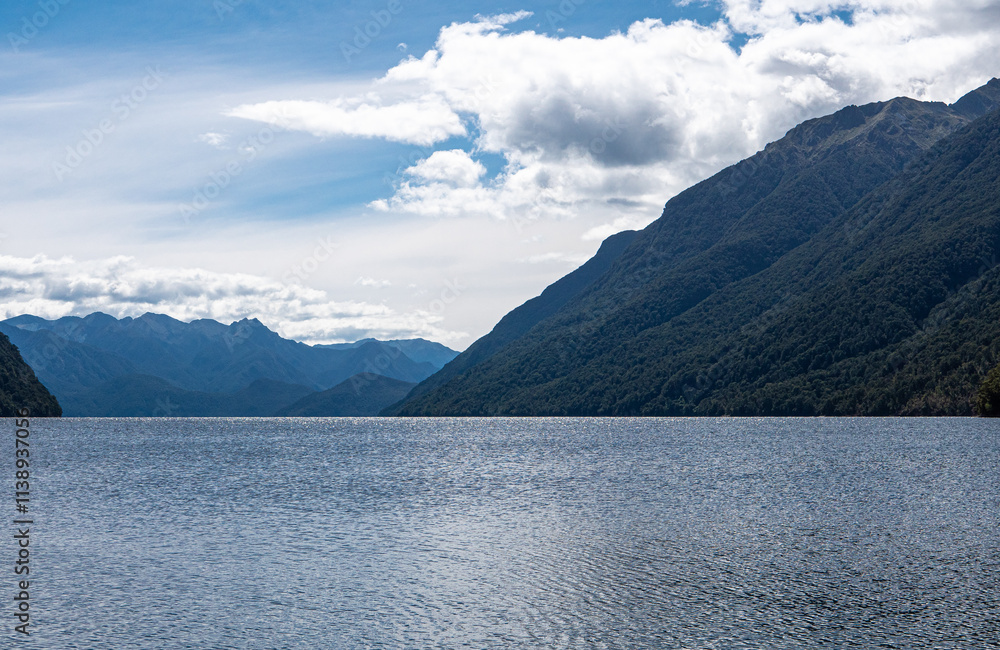 Lake manapouri te anau new zealand beautiful landscape fiordland national park hills mountains lush Lake manapouri te anau new zealand beautiful landscape fiordland national park hills mountains lush